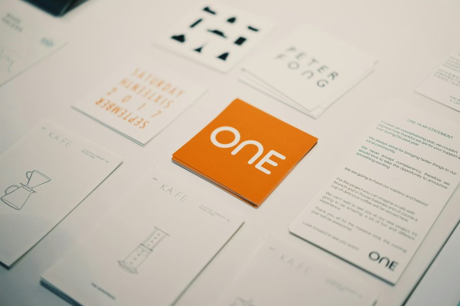 Printed identity pieces on the studio table