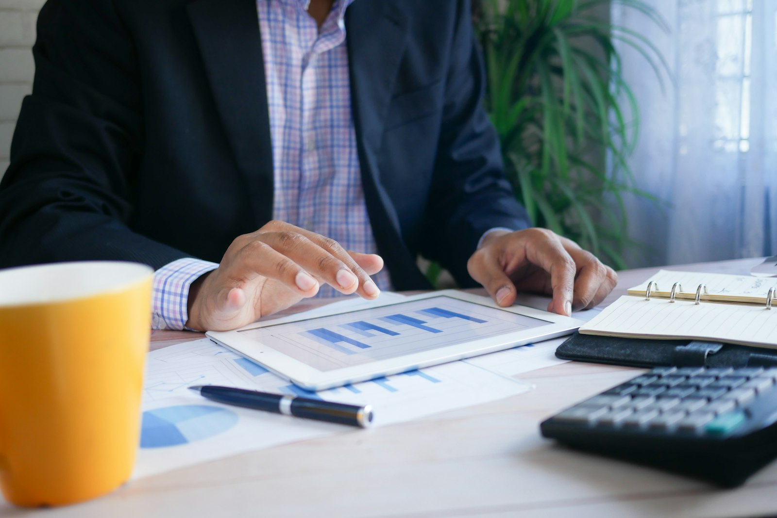 An adviser and a client talking through a plan