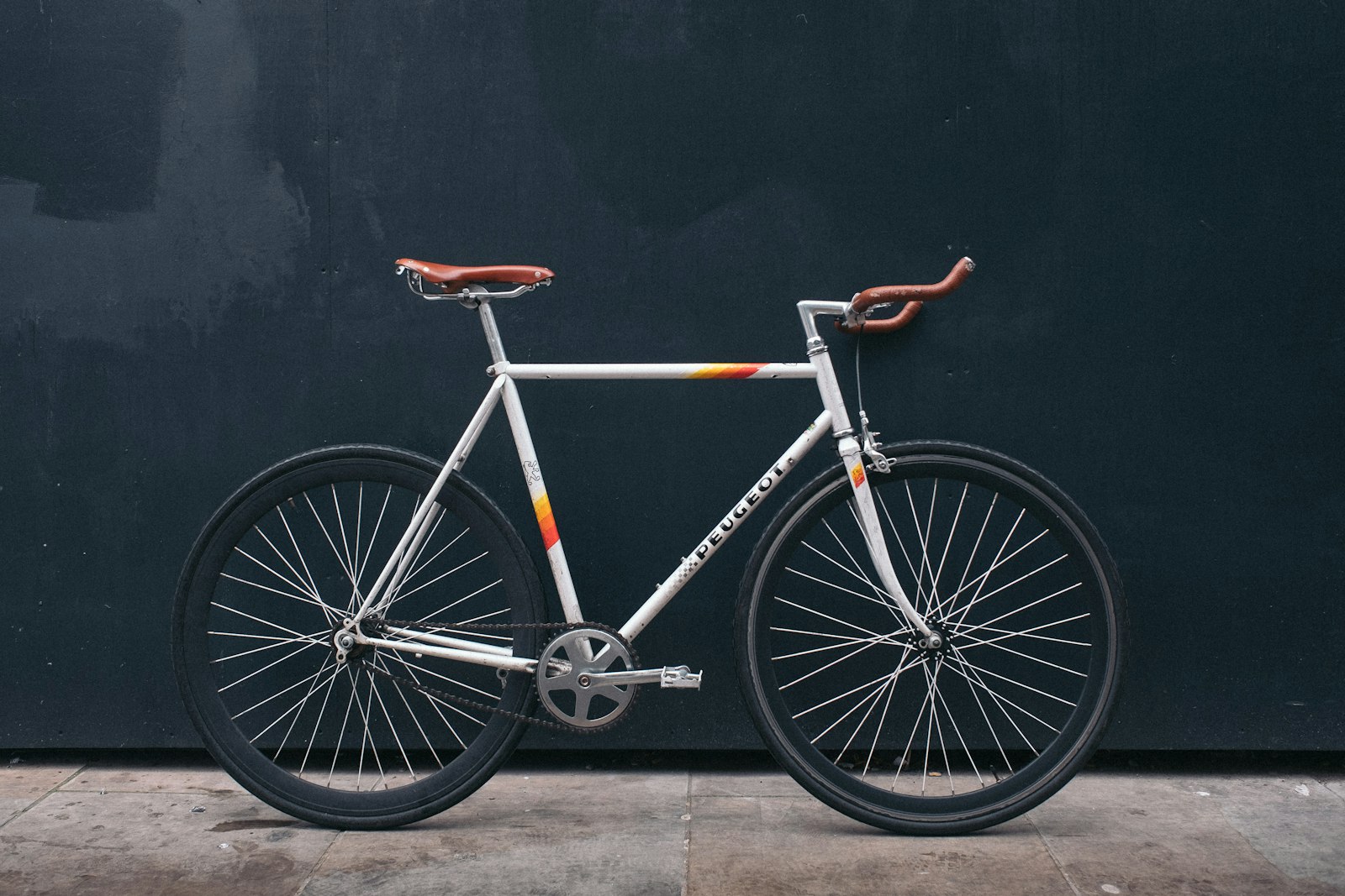 Kestrel One electric bike, side profile against a plain studio wall