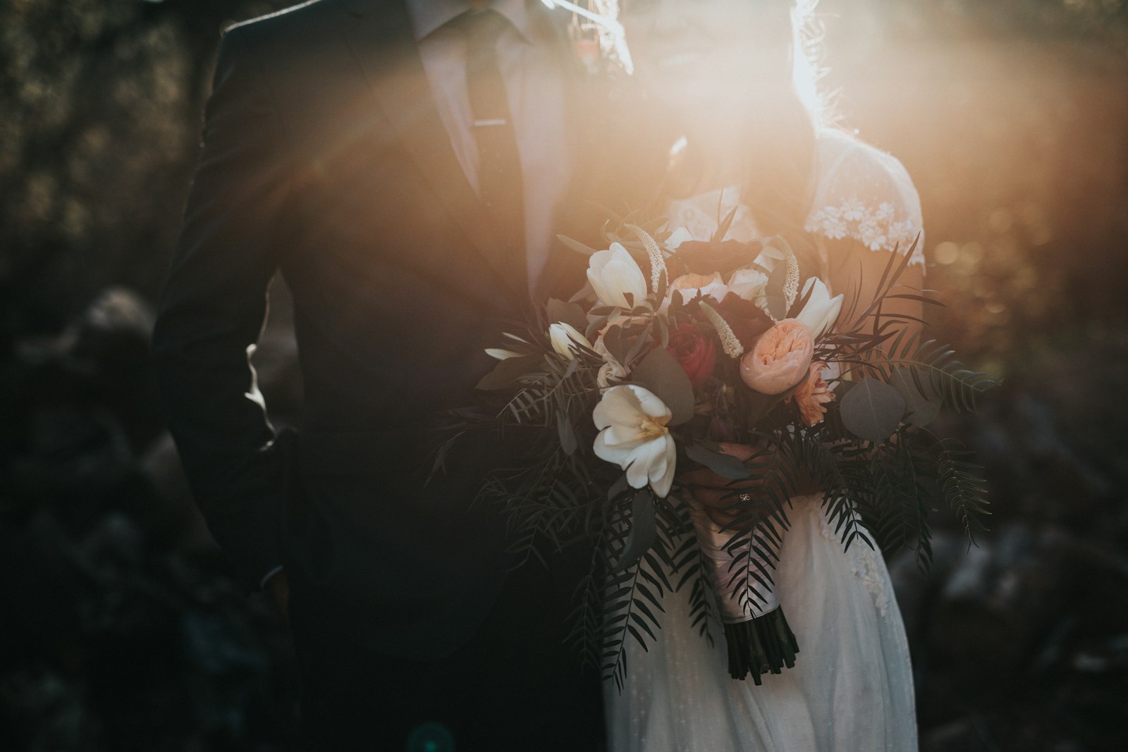 Bride and groom with her bouquet