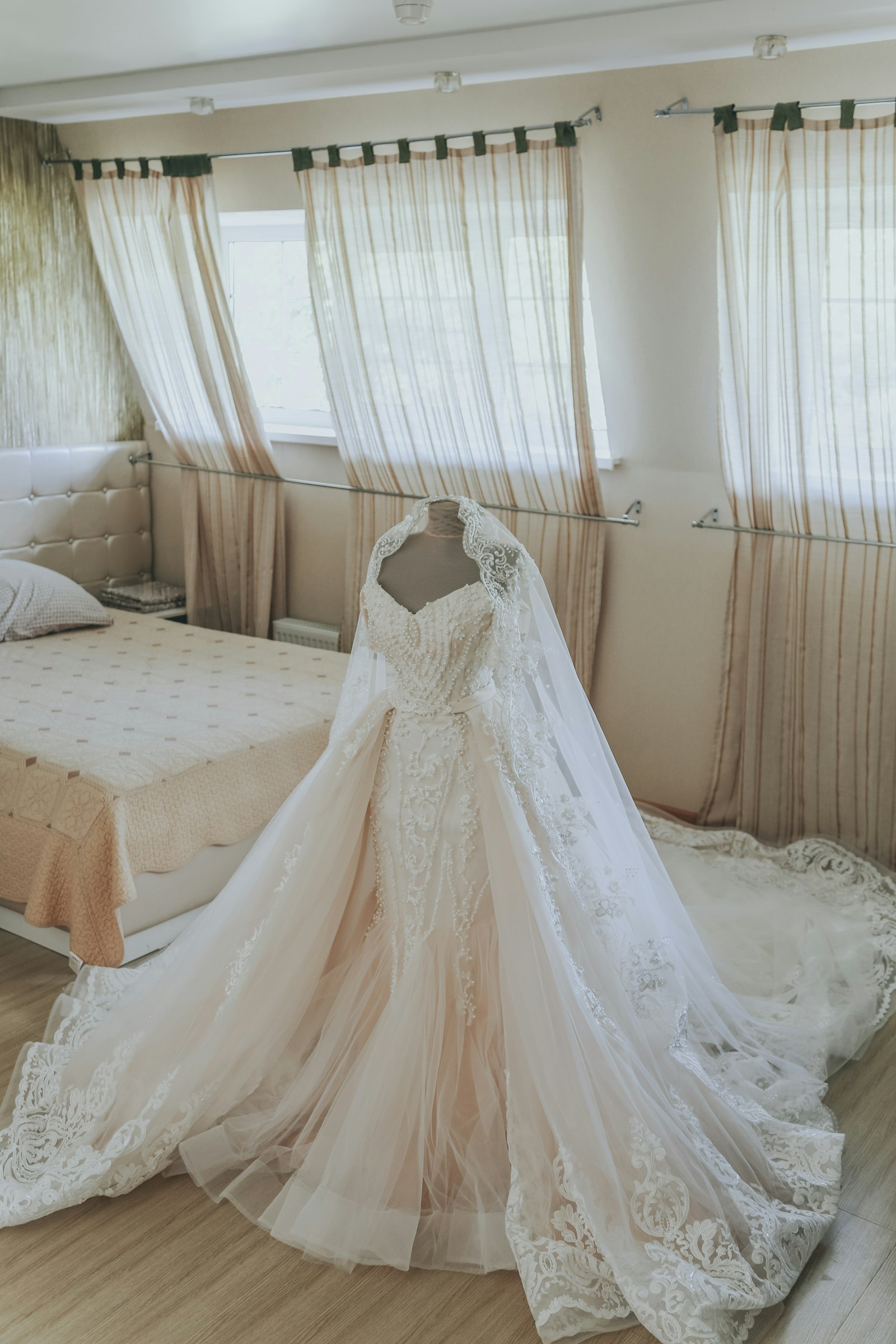 Wedding gown laid out by the window