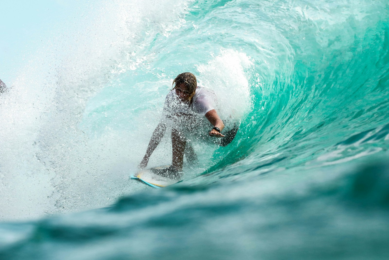 Surfers paddling out